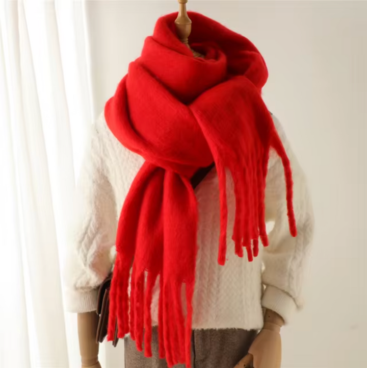 Showcasing the versatility of the women's elegant fringe winter scarf.