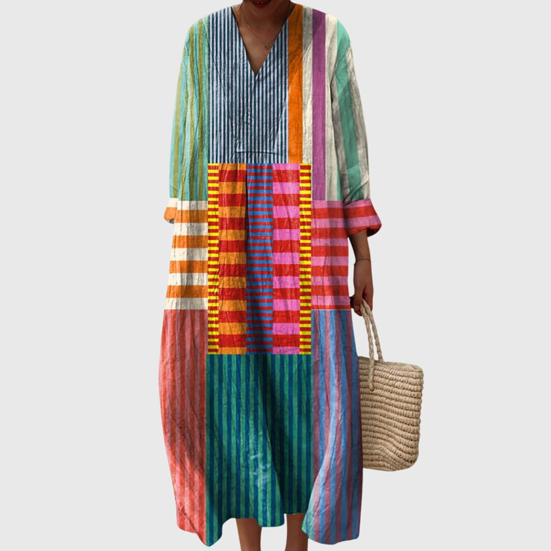 Women's elegant geometric pattern dress with flattering fit, perfect for day or night wear.