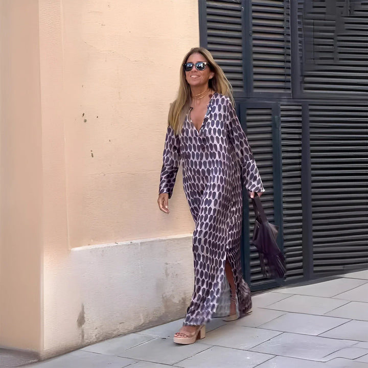 Women's elegant geometric-print maxi dress with long V-neck sleeves & stylish side slit. Perfect for spring & fall.
