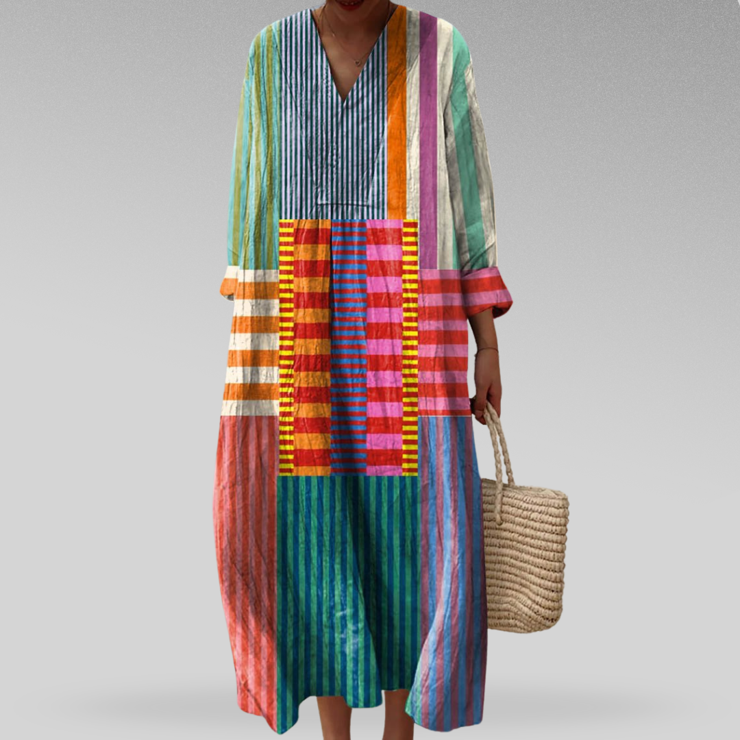 Women's elegant geometric print summer midi dress, perfect for casual day wear. Comfortable patterned fashion.