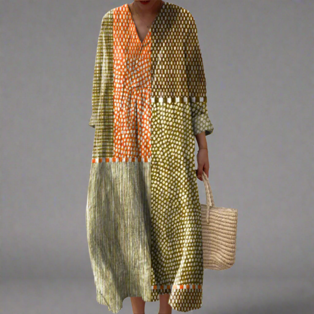 Women's elegant geometric print summer midi dress. Comfortable, relaxed fit, perfect for casual or holiday wear.
