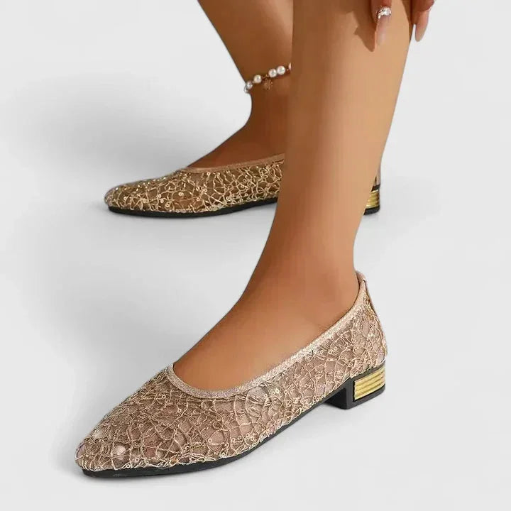 Comfortable women's gold slip-on flats with a chic pointed toe and low heel for everyday fashion.