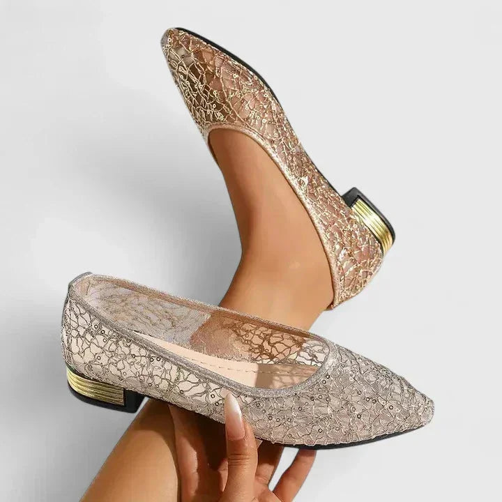 Gold pointed-toe ballet flats for women, featuring a comfortable low heel and slip-on style, perfect for elegance.