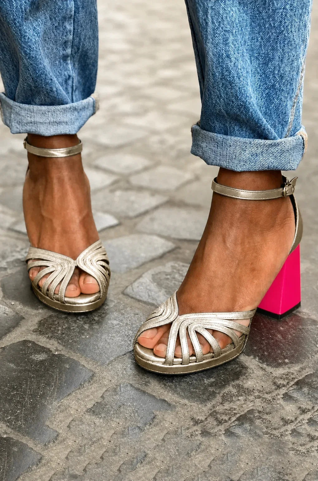Metallic gold strappy sandals for women, featuring a comfortable pink block heel. Ideal elegant summer party footwear.