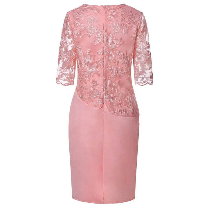 Elegant women's grey knee-length dress with a delicate embroidered overlay, round neck, and short sleeves.