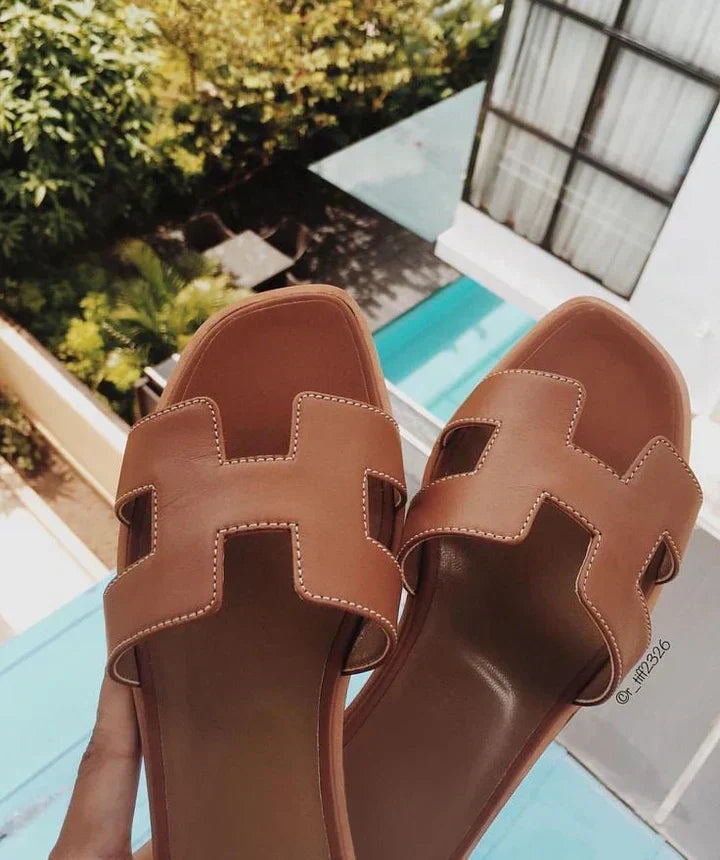 Casual yet elegant H-strap leather sandals, perfect summer footwear for women.