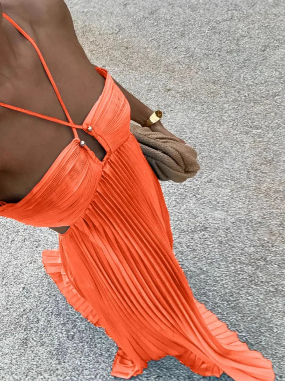 Chic women's halter neck pleated maxi dress with trendy cut-out detail & high waist for any elegant occasion.