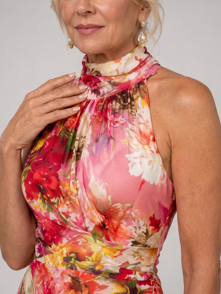 Sleeveless long halter neck maxi dress for women, featuring a beautiful floral print; elegant & flowing for summer.