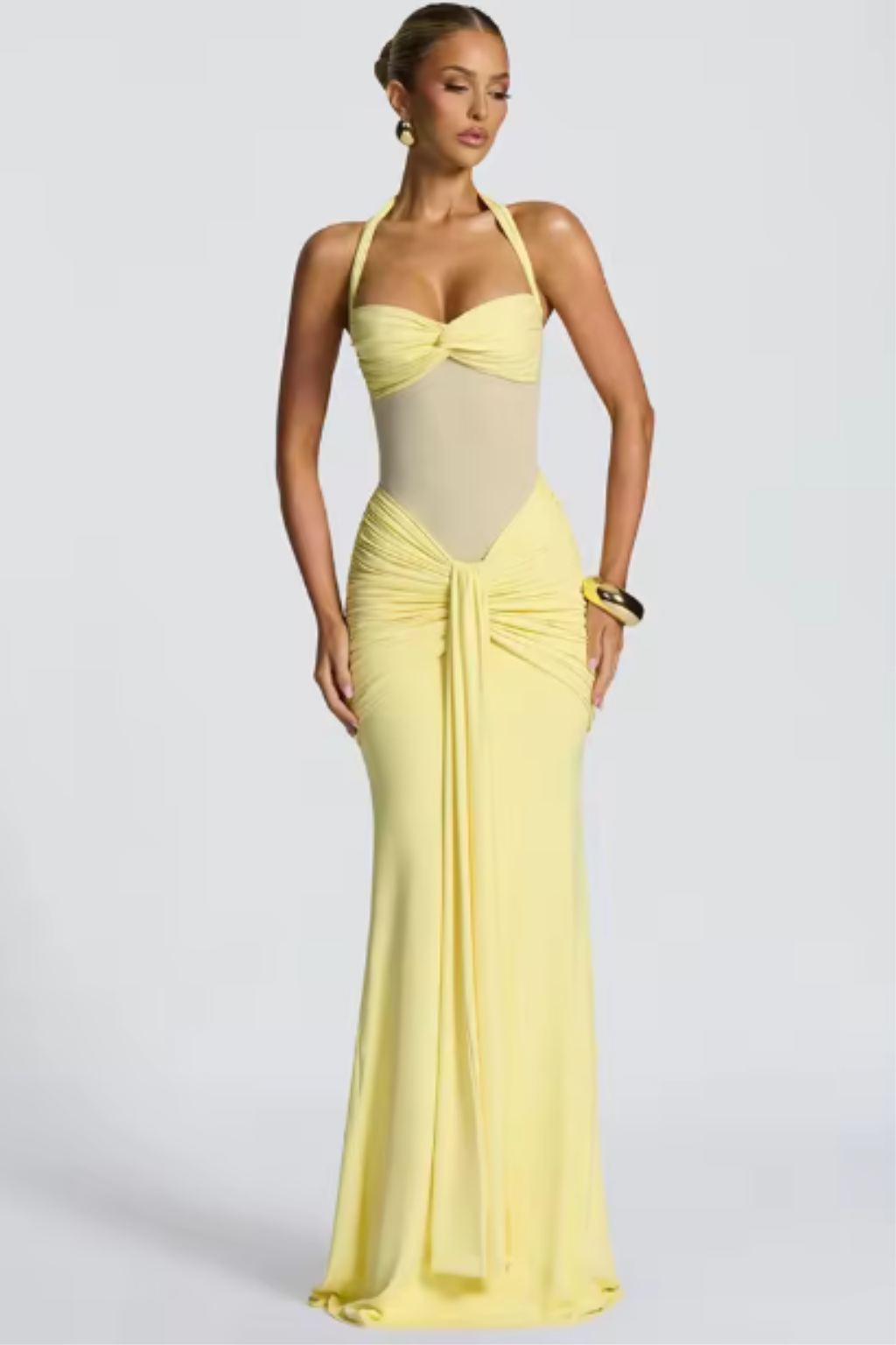 Sophisticated women's halter neck formal maxi gown with a stylish twist front, ideal for evening wear.