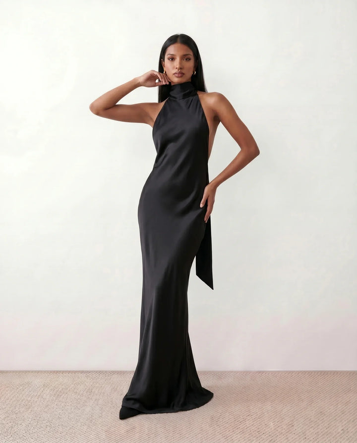 Perfect summer women's halter maxi dress, offering elegant style and comfort for vacation wear.