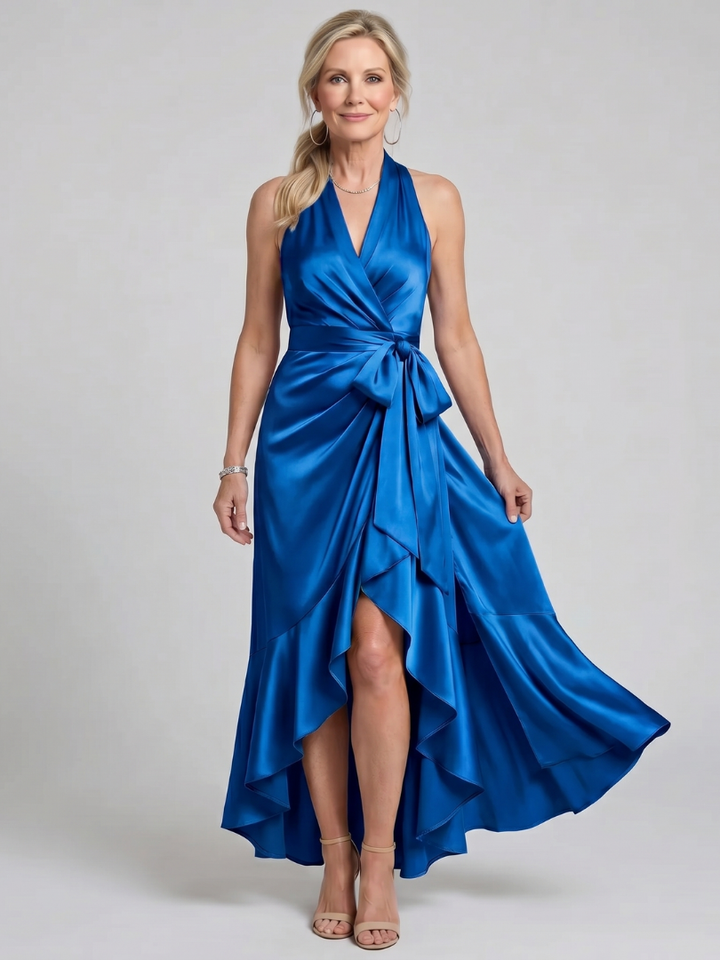 Women's chic halter neck dress, midi length, flattering asymmetric hem. Perfect for special events.