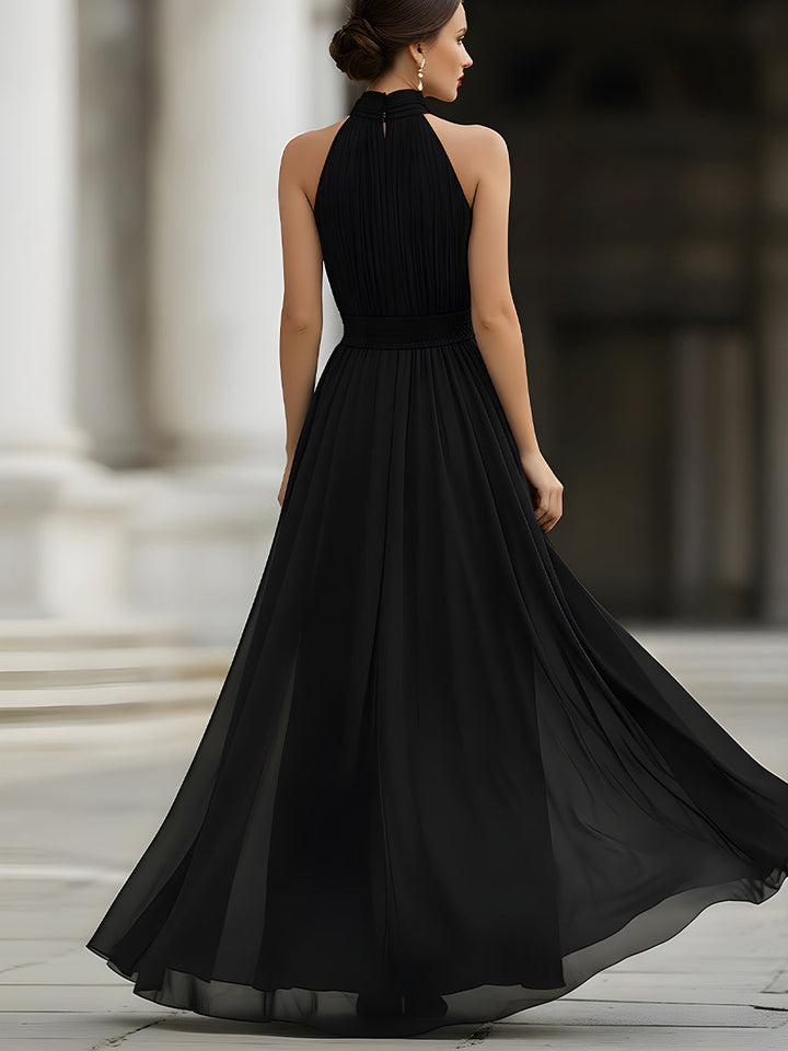 Graceful women's pleated maxi evening gown with halter neckline, versatile for formal dinners & special events.