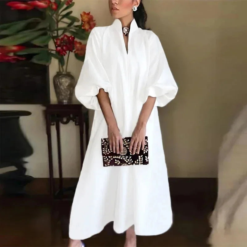 Women's elegant high-neck maxi dress with stylish balloon sleeves & loose, flowing fit. Versatile for summer.