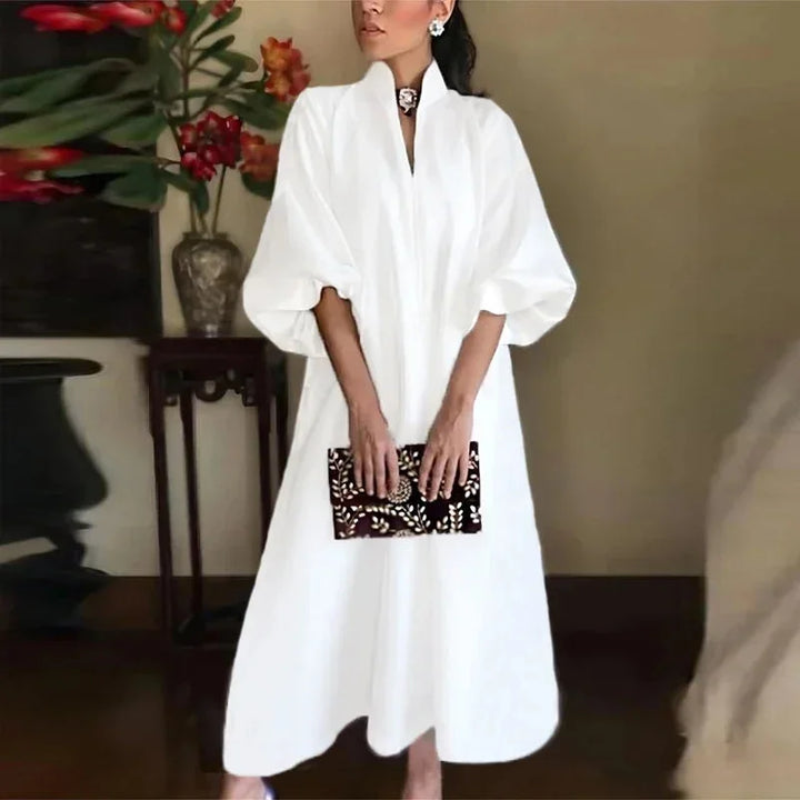 Women's elegant high-neck maxi dress with stylish balloon sleeves & loose, flowing fit. Versatile for summer.