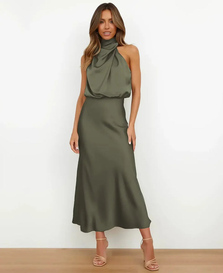 Women's summer elegant midi dress, sleeveless and high-waisted.