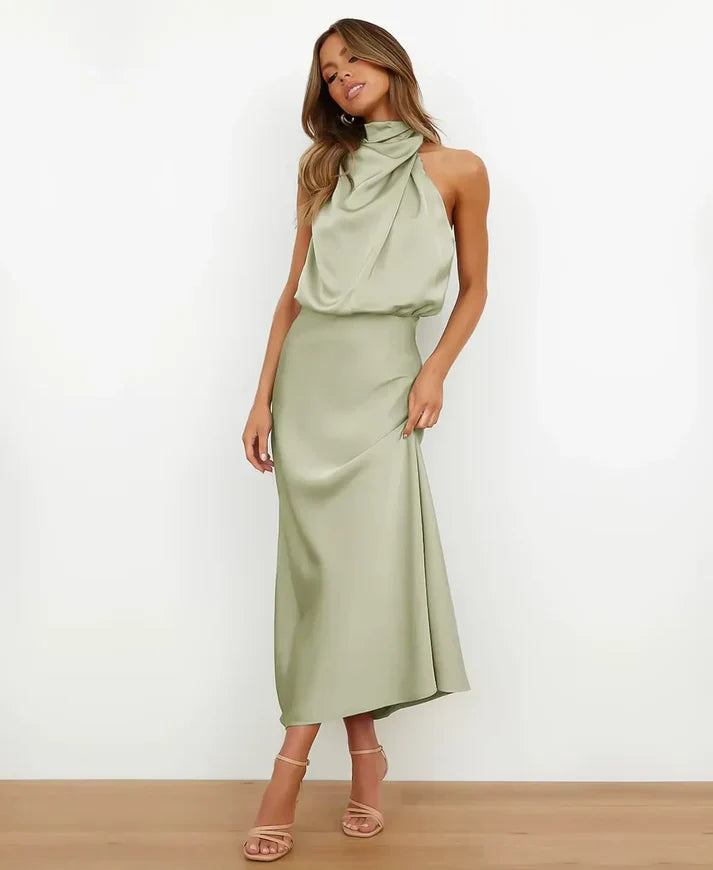 Summer-ready sleeveless midi party dress for a sophisticated woman.