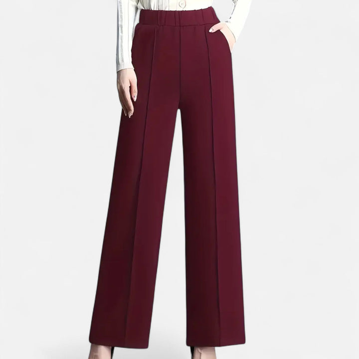 Women's elegant high-waist wide-leg brown trousers, comfortable fit for smart casual wear.