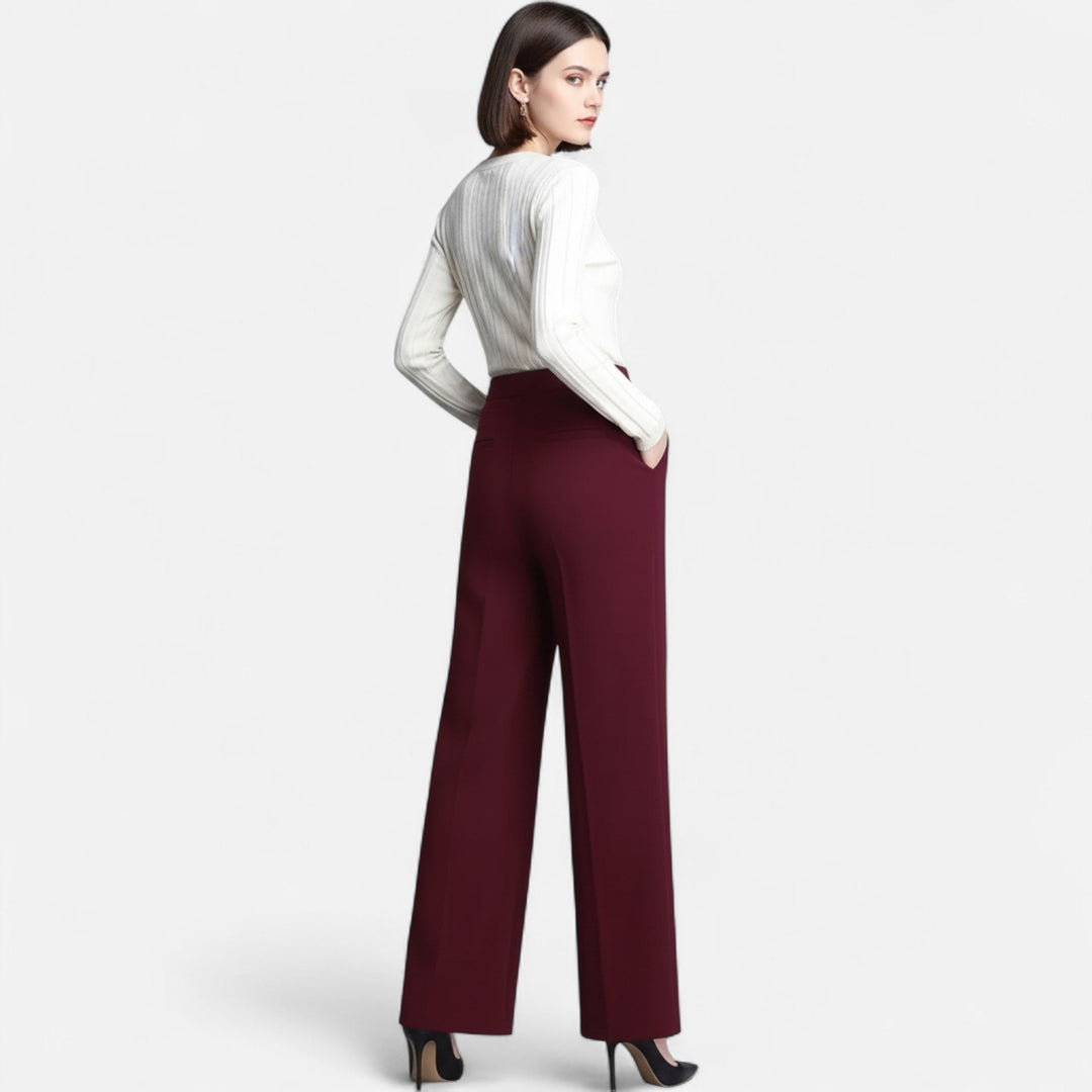 Model wearing comfortable women's work pants, high-waist wide-leg style in brown.