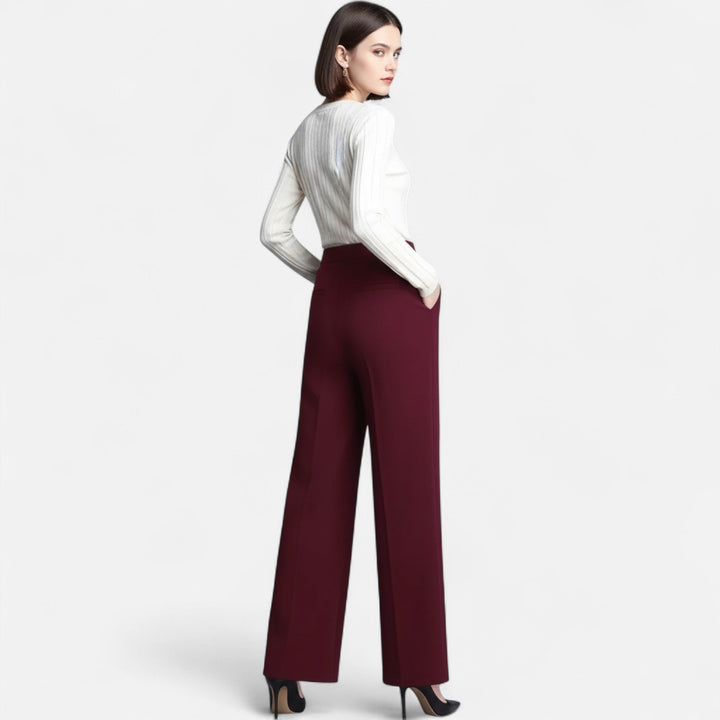 Model wearing comfortable women's work pants, high-waist wide-leg style in brown.