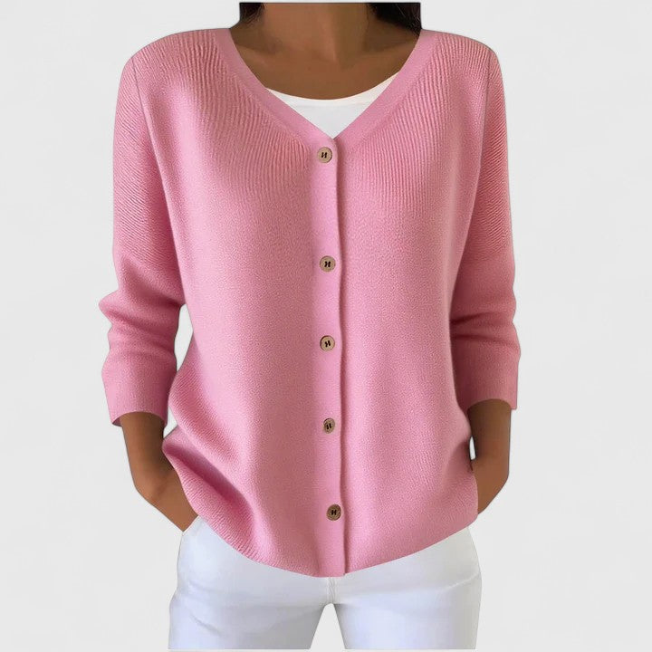 Cozy women's hooded button-down cardigan. A long sleeve, relaxed fit sweater, ideal for everyday layering.