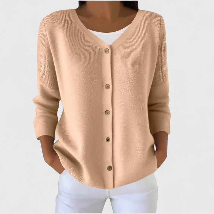 Stylish women's hooded cardigan, a versatile long sleeve layering piece with a comfortable, relaxed fit.