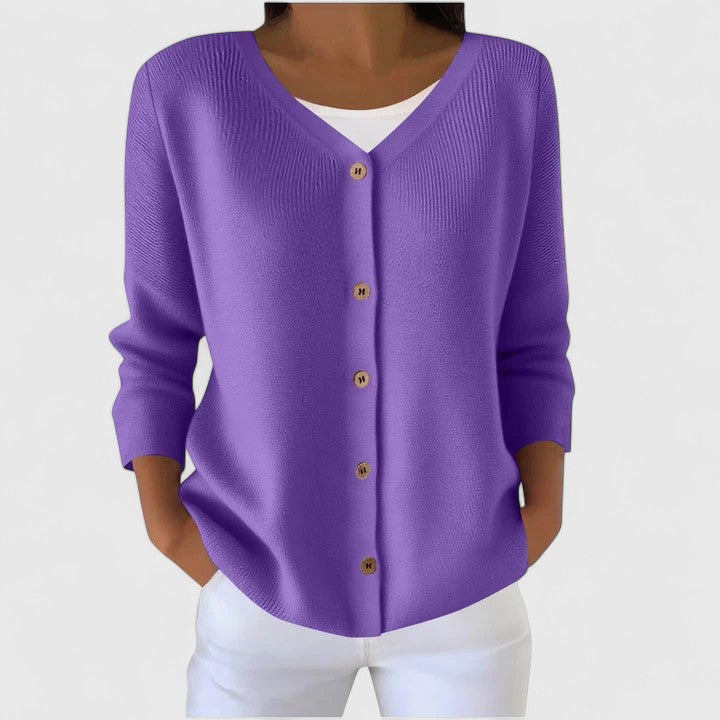 Woman wearing a relaxed fit hooded button-down cardigan. Great for casual wear & cozy, everyday fashion.