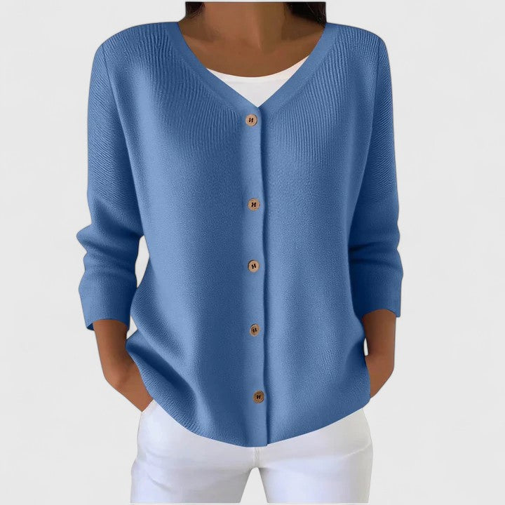 Soft knit women's hooded cardigan with buttons, a cozy long sleeve sweater for versatile layering.