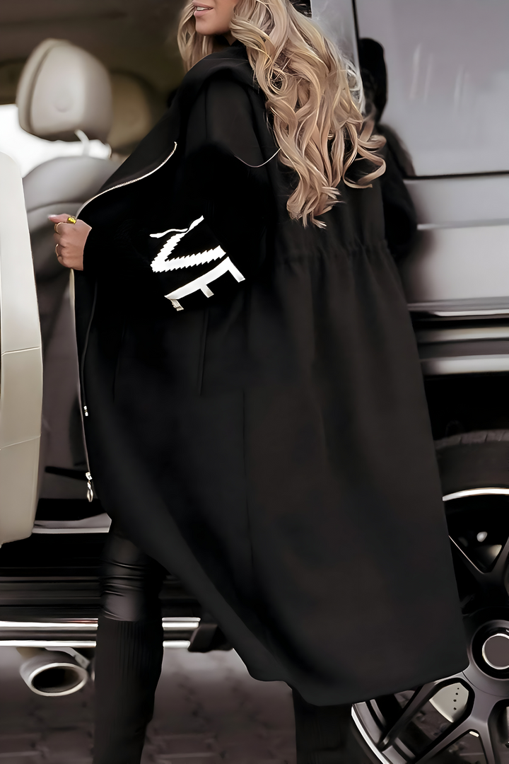 Comfortable women's coatigan with a hood, offering chic style and versatile layering for any occasion.