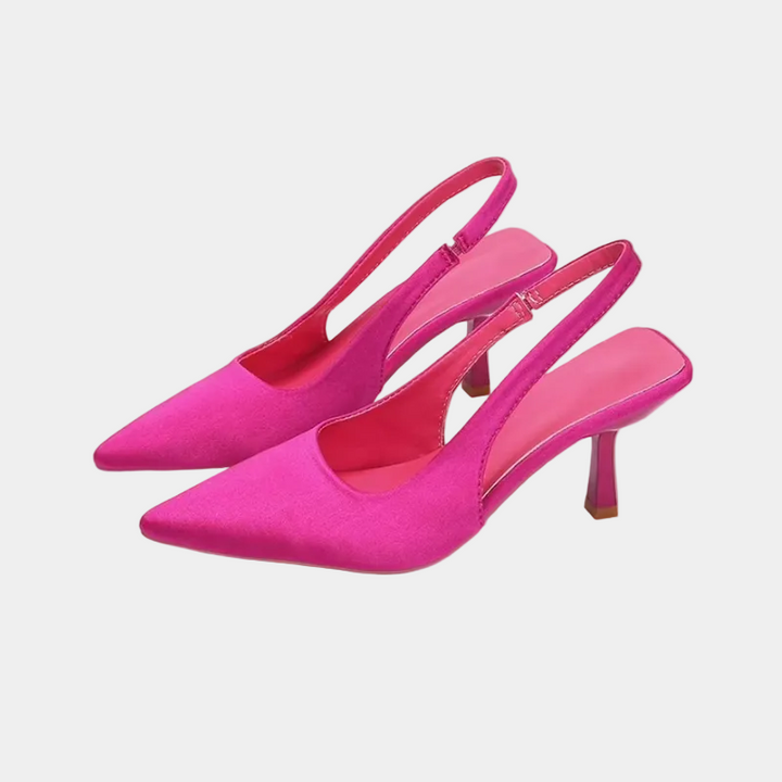 Chic women's slingback heels with a pointed toe and kitten heel, ideal formal footwear for fashion-forward women.