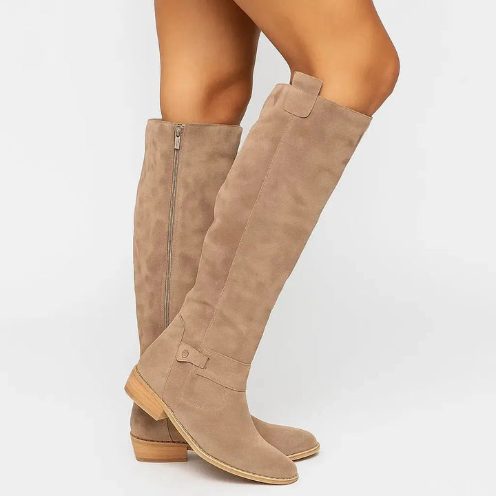 Women's elegant knee-high suede boots with a comfortable block heel & zip closure, perfect for fall fashion.