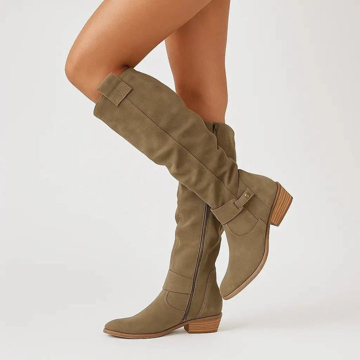 Classic women's dark green suede knee-high boots with a sturdy block heel, offering comfortable & stylish wear.