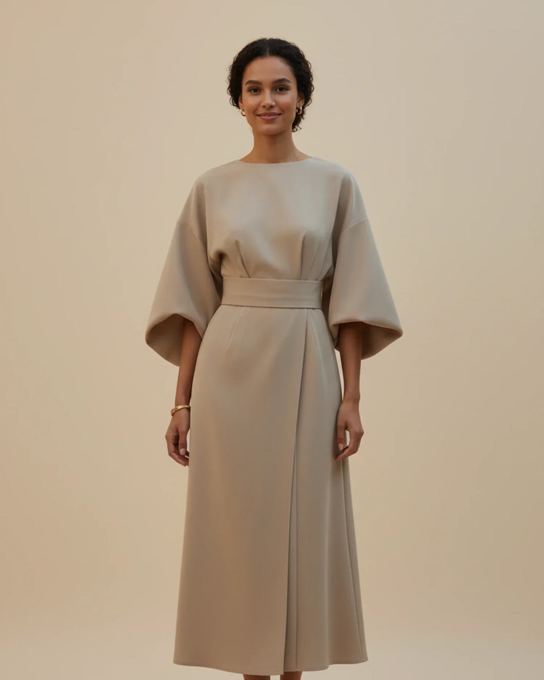 Sophisticated occasion dress with feminine lantern sleeves and a midi length.