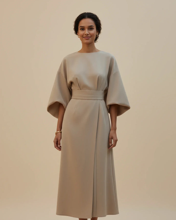 Sophisticated occasion dress with feminine lantern sleeves and a midi length.