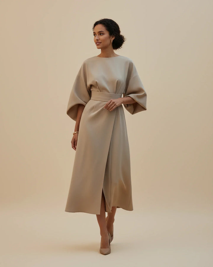 Ethereal lantern sleeve midi dress, ideal for a graceful and fashionable look.
