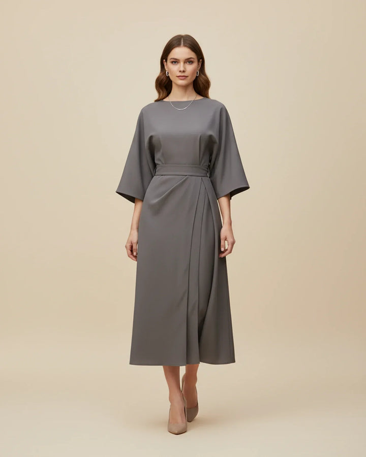 Discover this elegant midi dress with unique lantern sleeves and a feminine cut.