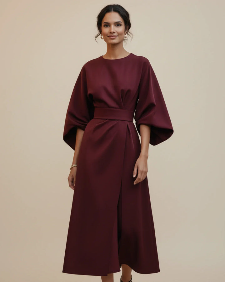 Experience comfort and style in this belted wrap midi dress for women.