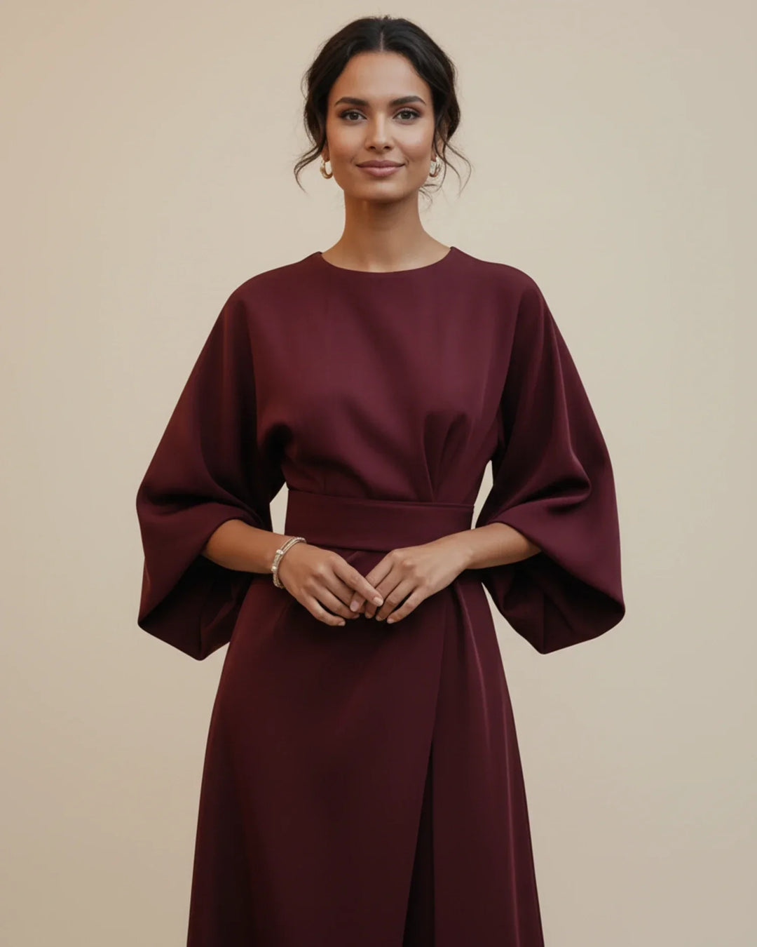 Graceful women's midi dress showcasing elegant lantern sleeves and a flattering wrap.