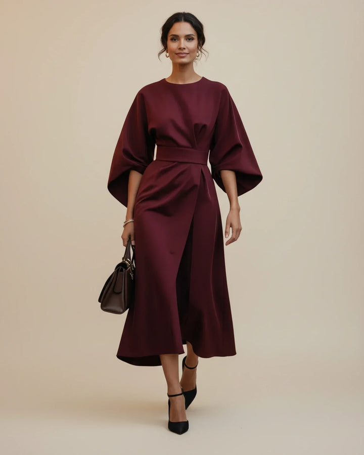The ultimate occasion midi dress: a chic belted wrap with distinctive lantern sleeves.