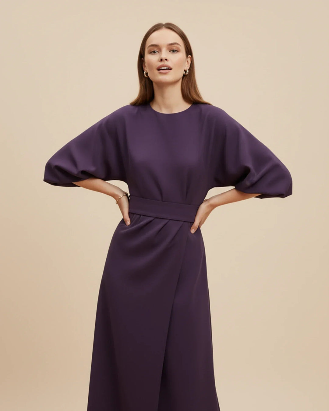 Elegant midi dress for women, showcasing a sophisticated lantern sleeve silhouette.