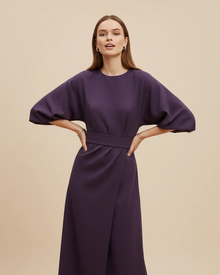 Elegant midi dress for women, showcasing a sophisticated lantern sleeve silhouette.