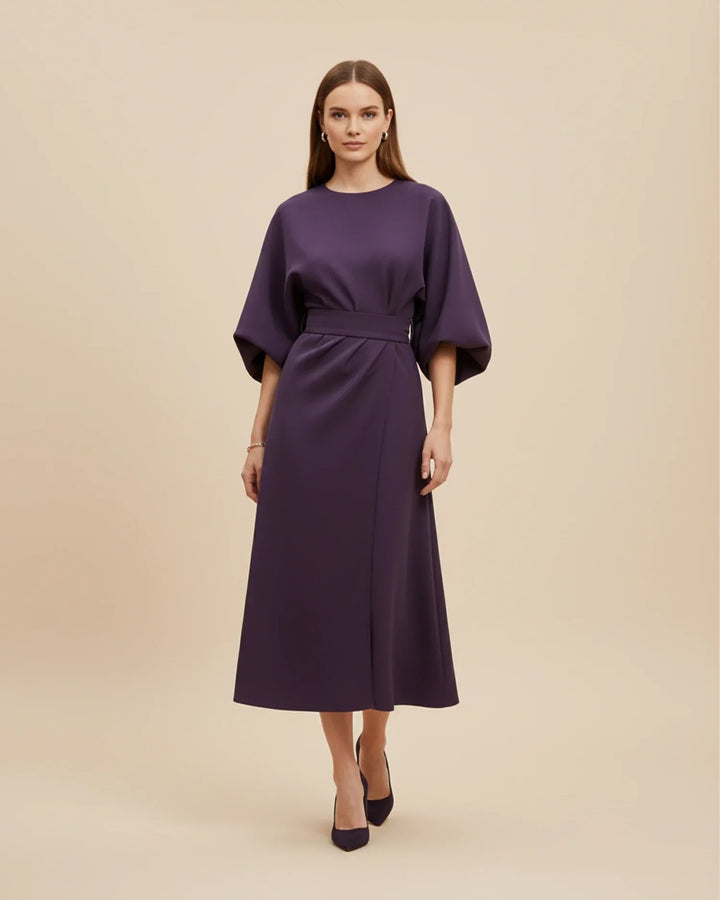 Comfortable and chic summer midi dress with a secure belted wrap closure.