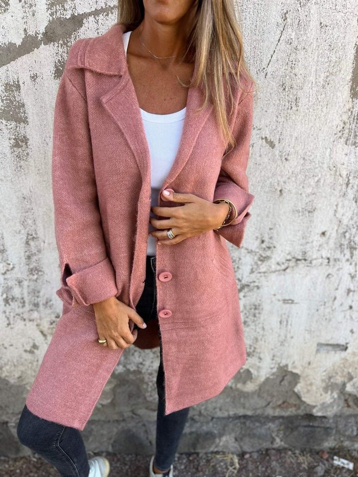 Stylish women's long coat with elegant lapel collar & button-front closure, ideal for autumn fashion.