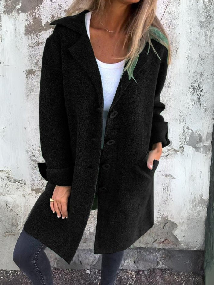 Sophisticated women's lapel collar button-front coat, versatile elegant outerwear for autumn and winter.