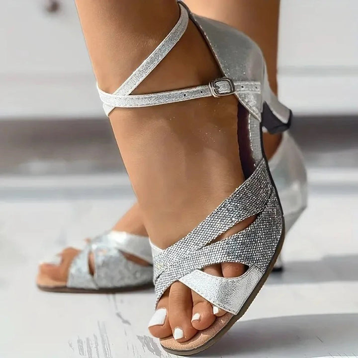 Luxurious women's Latin dance footwear with an elegant heel, ensuring style and comfort for dancers.