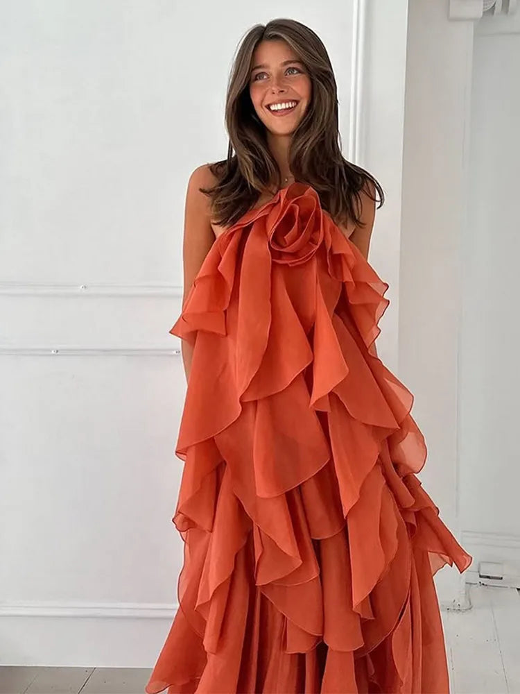 Women's elegant layered ruffle maxi dress, perfect for summer vacations. Flowy design with a beautiful floral neckline.