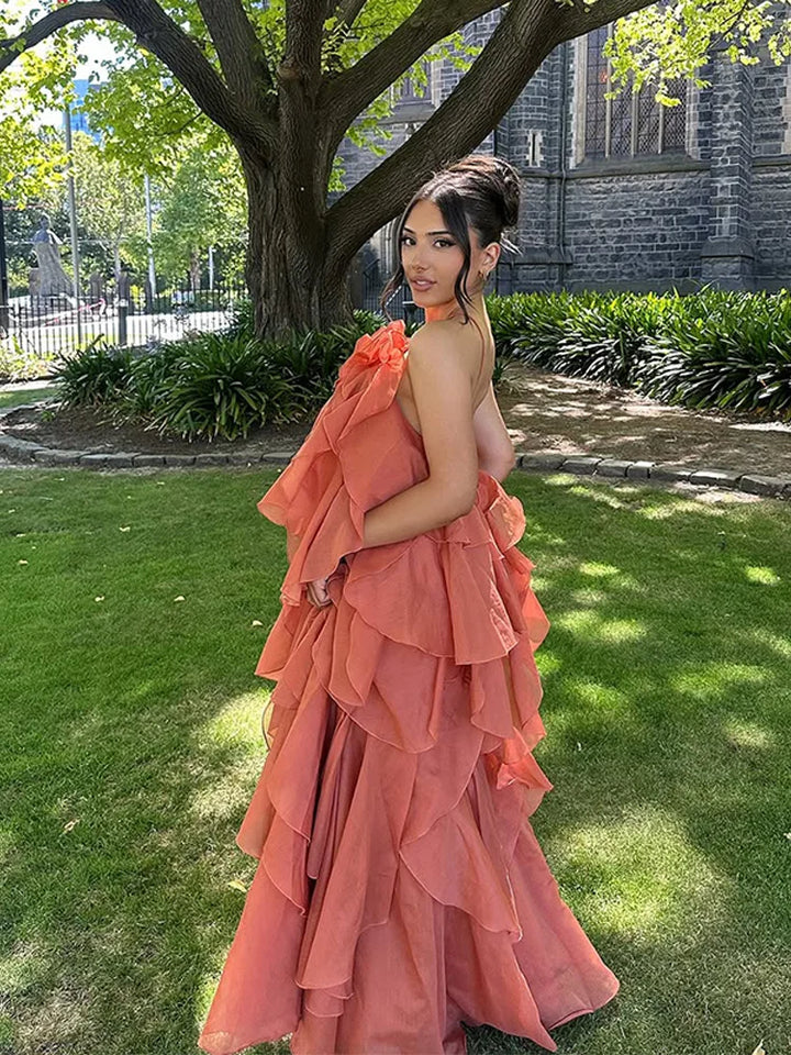 Beautiful women's layered ruffle maxi dress, offering elegant resort wear or a stylish vacation outfit.