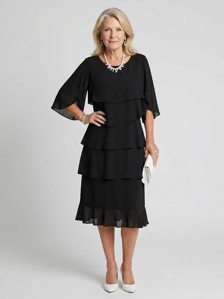 Women's elegant layered tier midi dress, perfect for summer casual or chic occasions.