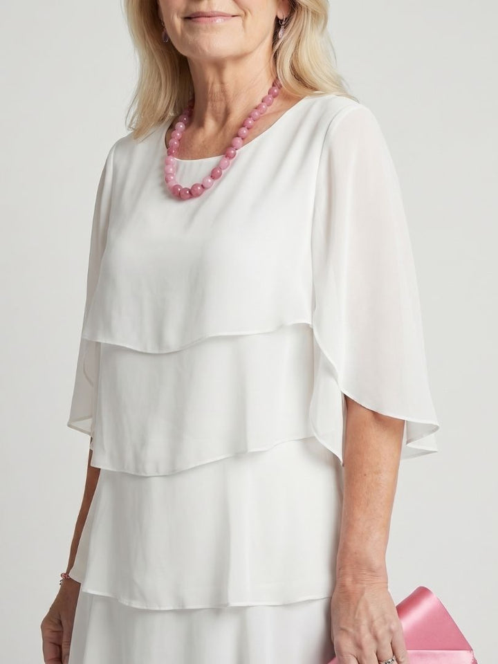 Daily wear women's midi dress, chic layered tiers, perfect for a comfortable & stylish spring day.