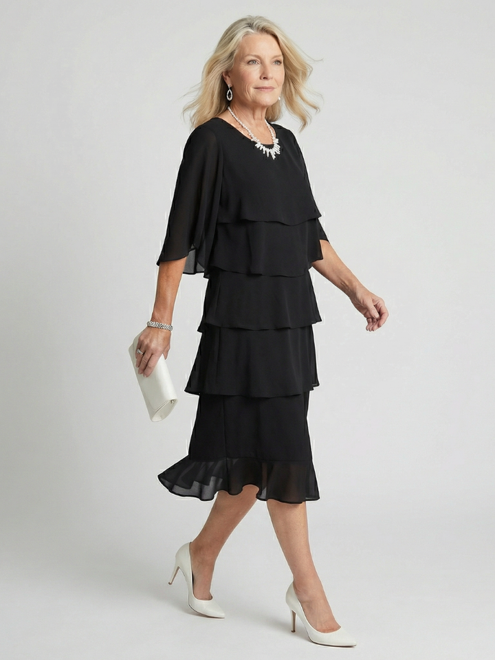 Chic women's tiered midi dress with a relaxed fit, short sleeves & round neck for daily wear.