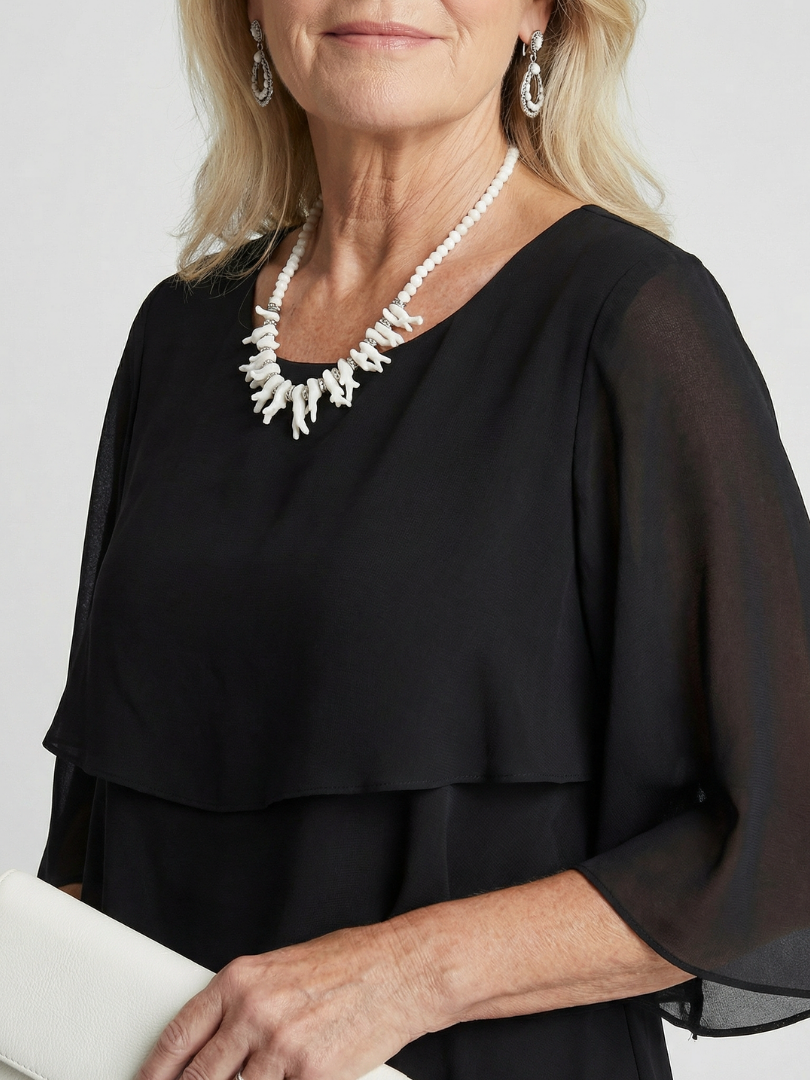 Versatile layered midi dress for women, elegant and casual, ideal for spring fashion.